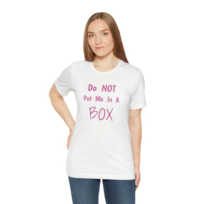 A woman wearing a DO NOT PUT ME IN A BOX.