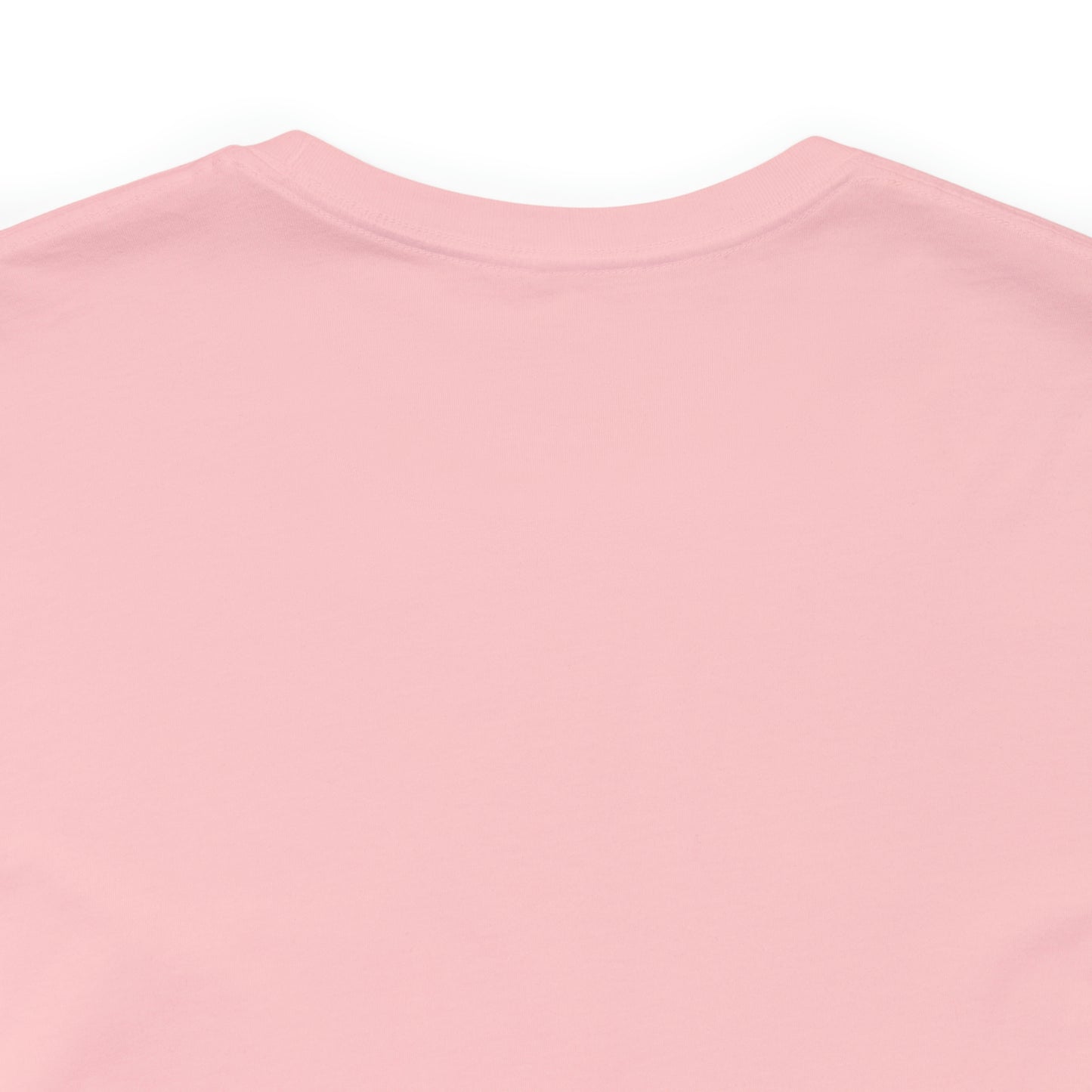 A pink cotton DO NOT PUT ME IN A BOX tee shirt.