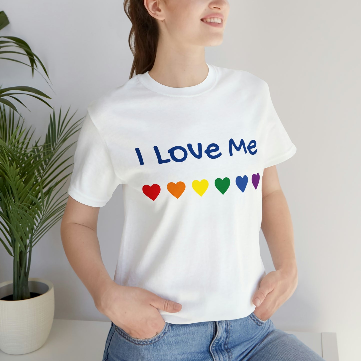 A woman wearing an "I love Me" soft cotton classic unisex tee with a quality print.